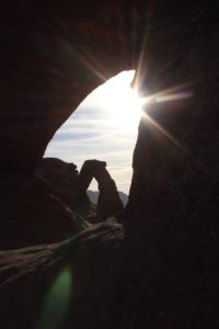 Delicate Arch through a smaller arch.